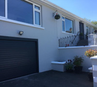 Black garage door In Comber, Belfast & North Down