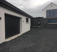 Black garage door In Comber, Belfast & North Down